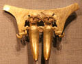 Gold double pendant from Veraguas, Panama at de Young Museum. San Francisco, CA.