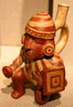 Moche earthenware kneeling warrior from Peru at de Young Museum. San Francisco, CA.
