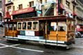 Cable car passing Chinatown. San Francisco, CA.