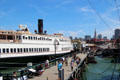 Eureka ferry boat against skyline of San Francisco at Maritime National Historical Park. San Francisco, CA.