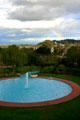 Marin County Civic Center pool with rainbow. Marin, CA.