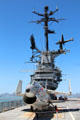 Island Bridge with Chance Vought F-8 Crusader on deck of USS Hornet CV-12. Alameda, CA