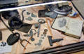 "Families on The Trail" display shows items brought west at Tuolumne County Museum. Sonora, CA.