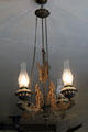 Antique ceiling kerosene lamp in Bixel Brewery at Columbia State Historic Park. Columbia, CA.