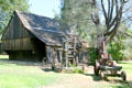 Wooden barn & machinery. Shasta, CA.