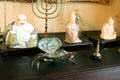 Buddha figurines on piano at Pardee Home Museum. Oakland, CA.