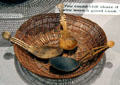 Klamath River native man's spoon on Hupa open-weave basket at Oakland Museum of California. Oakland, CA.