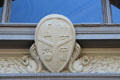Coat of arms with squirrels plaque on Westlake Building. Oakland, CA.