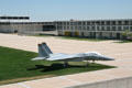 Mitchell dining facility & Sijan Hall dormitory over McDonnell-Douglas F-15 Eagle at USAF Academy. Colorado Springs, CO.