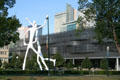 Dancers sculpture against undulating screens of Colorado Convention Center. Denver, CO.