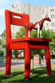 The Yearling by Donald Lipski, a life-sized horse on a super-sized chair at Denver Central Library. Denver, CO