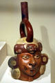 Moche earthenware portrait bottle from North Coast of Peru at Denver Art Museum. Denver, CO.