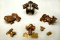 Diquis & Tairona gold frog pendants from Costa Rica & Colombia at Denver Art Museum. Denver, CO.