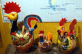 Trio of multicolored pottery chickens from Latin America at Museo de las Americas. Denver, CO.