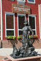 Cowboy's Day Off statue showing cowboy fishing by Michael Hamby. Golden, CO.