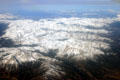 Snowy expanse of Rocky Mountains from air. CO.