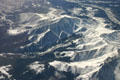 Snow covered Rocky Mountain ridges from air. CO.