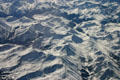 Repetitive peaks of Rocky Mountains from air. CO.