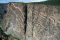Painted Wall cliff is 2,300 feet tall or about twice height of Empire State Building at Gunnison National Park. CO.