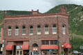 Louis Wyman Hotel in red sandstone with carved burro above door. Silverton, CO.