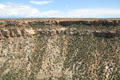 View across Soda Canyon to cave holding Hemenway House in Mesa Verde National Park. CO.