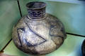 Pueblo pottery water jar with narrow spaced lines typical of Classic Mesa Verde Style at Mesa Verde Museum. CO.