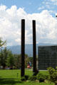 Sculptures of Colorado Springs Fine Arts Center with mountains & clouds. Colorado Springs, CO.