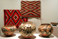 Navajo rugs & Acoma polychrome pottery jars at Colorado Springs Fine Arts Center. Colorado Springs, CO.