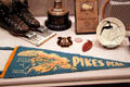 Pikes Peak pennant & other souvenirs at Colorado Springs Pioneers Museum. Colorado Springs, CO.