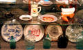 Souvenir Pikes Peak plates & bottles at Colorado Springs Pioneers Museum. Colorado Springs, CO.