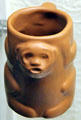 Ceramic cup with face by Van Briggle Pottery at Colorado Springs Pioneers Museum. Colorado Springs, CO.