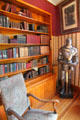 Library with knight's armor at Miramont Castle. Manitou Springs, CO.