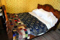 Bed with quilt in Chambers Home at Rock Ledge Ranch Historic Site. Colorado Springs, CO.