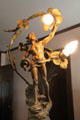 Le Torrent sculpture by Aug. Moreau holding lamp on staircase in Orchard House at Rock Ledge Ranch Historic Site. Colorado Springs, CO.