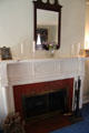 Parlor fireplace at Orchard House at Rock Ledge Ranch Historic Site. Colorado Springs, CO.