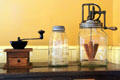 Coffee grinder, canning jar & churn in kitchen at Rosemount House Museum. Pueblo, CO.