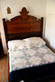 Wooden bed frame at Baca Adobe House. Trinidad, CO.
