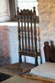 Banister-back chair with 19th C painting at Henry Whitfield State Museum. Guilford, CT.