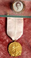 Julia Isham's Mayflower Descendants medal & photo at Isham-Terry House Museum. Hartford, CT.