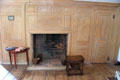 Fireplace with original paneling at Noah Webster House. West Hartford, CT.