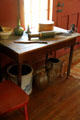 Kitchen with collection of containers & sausage press at Strong House. Windsor, CT.