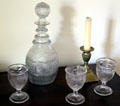 Molded glass carafe & glasses with candlestick at Dr. Hezekiah Chaffee House. Windsor, CT.