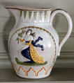 Ceramic pitcher with woman holding olive branch at Phelps-Hathaway House. Suffield, CT.
