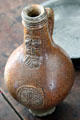 Ceramic bottle with face of European design at Phelps-Hathaway House. Suffield, CT.