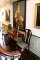 Portraits, side chairs & table in central hall at Joseph Webb House. Wethersfield, CT.