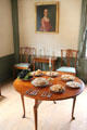 Drop leaf round table with pastries at Silas Deane House. Wethersfield, CT.
