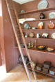 Folding ladder & pantry with pewter, ceramics and foot warmers at Silas Deane House. Wethersfield, CT.