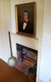 Fireplace with early portrait at Thankful Arnold House. Haddam, CT.