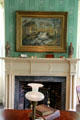 Parlor fireplace with Connecticut art at Florence Griswold Museum. Old Lyme, CT.
