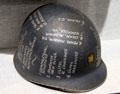 M1 Helmet traces WWII operations seen by U.S. Coast Guard officer Edward G. Allen at U.S. Coast Guard Museum. New London, CT.